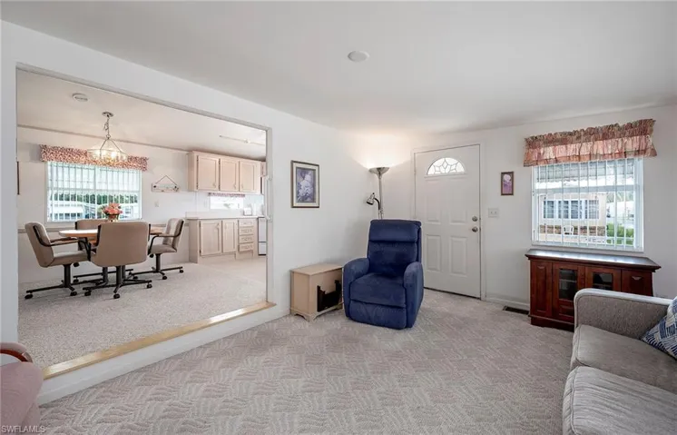 Living room with light carpet