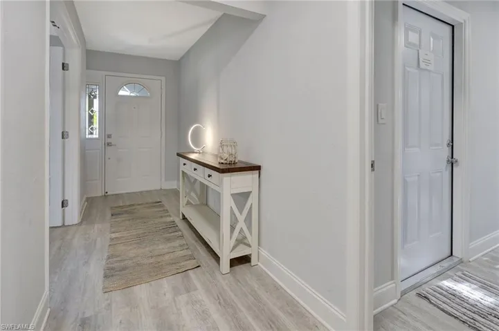 Foyer featuring light hardwood / wood-style flooring