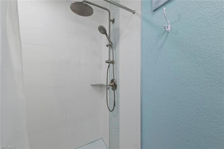 Beautifully tiled primary bath shower