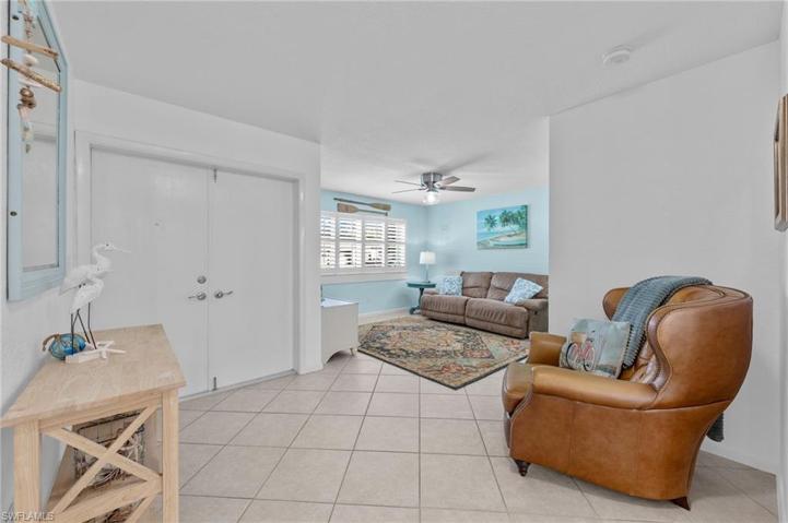 Front entry and family room area. Tile flooring on the diagonal.