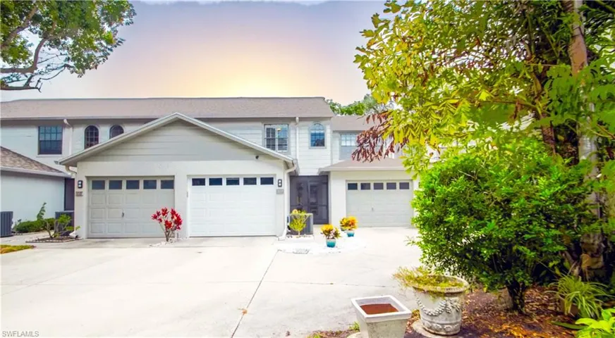Unit with the white garage door