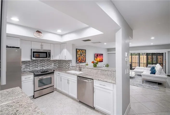 830  Meadowland  DR, Naples, FL 34108