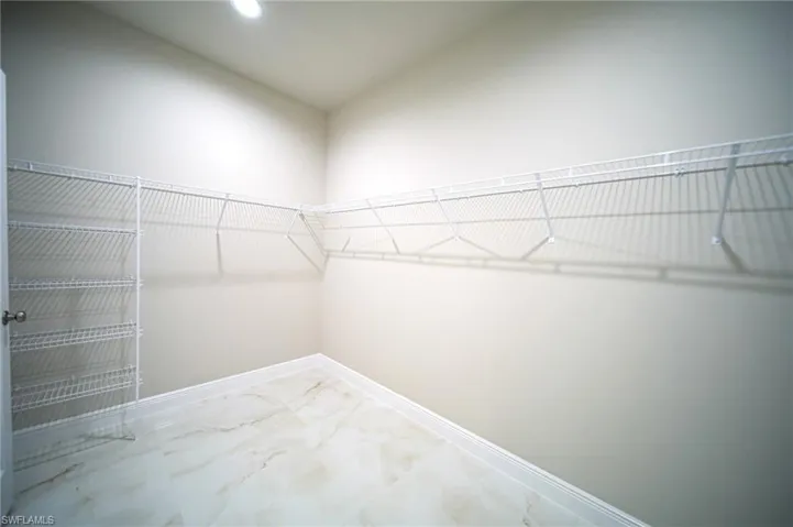 The Oversized Master Bedroom Closet Comes With All Wall Shelving And A Shoe Wall!