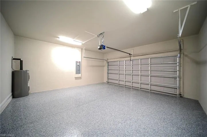Oversized Two Car Garage With Epoxy Flooring!