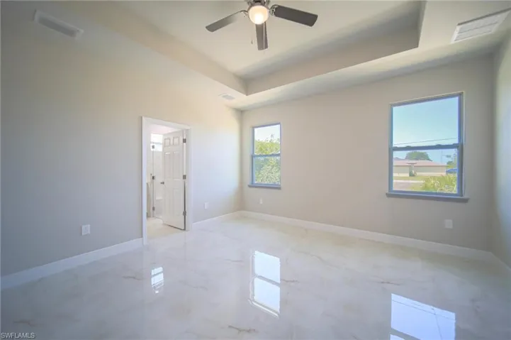 The Oversized Master Bedroom Has Multiple Windows, Tray Ceilings, Huge Walk-In Closet, And Ceiling Fan With Light!