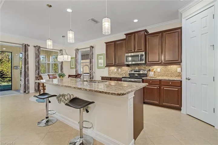 Large kitchen with 42" upper cabinetry and a spacious pantry!