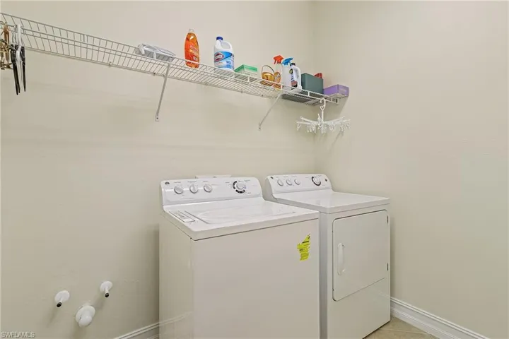Large laundry room equipped for a wetsink.