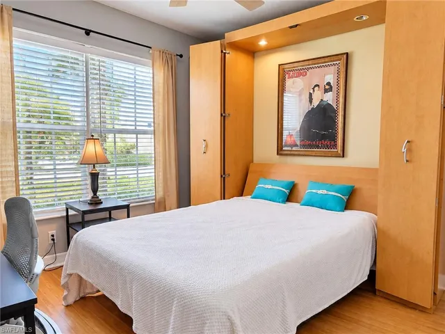 Guest Bedroom with nice closet space and added storage within the Murphy bed