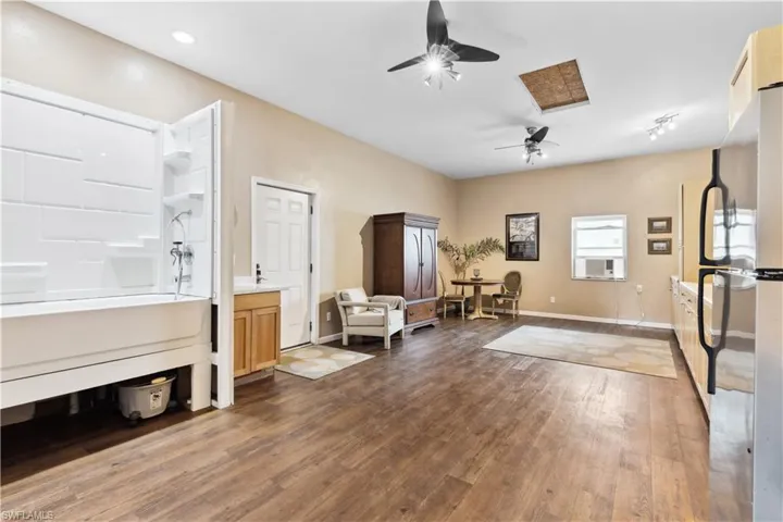 Feed and tack room with grroming area between horse stables and in-law quarters