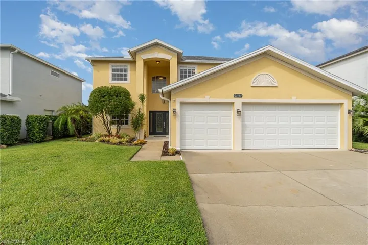 View of front of home with 3-car garage