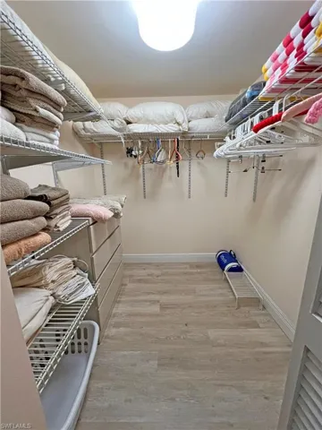 Spacious walk-in closet in primary suite