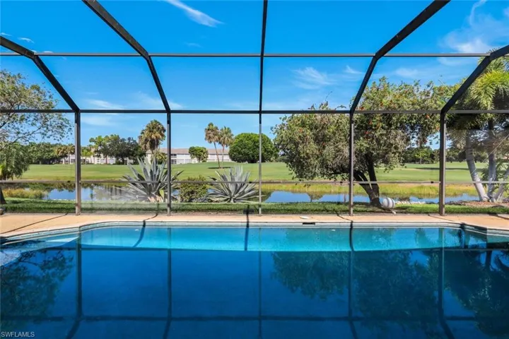 Pool off Living Room/Great Room with Lake and Golf Course View