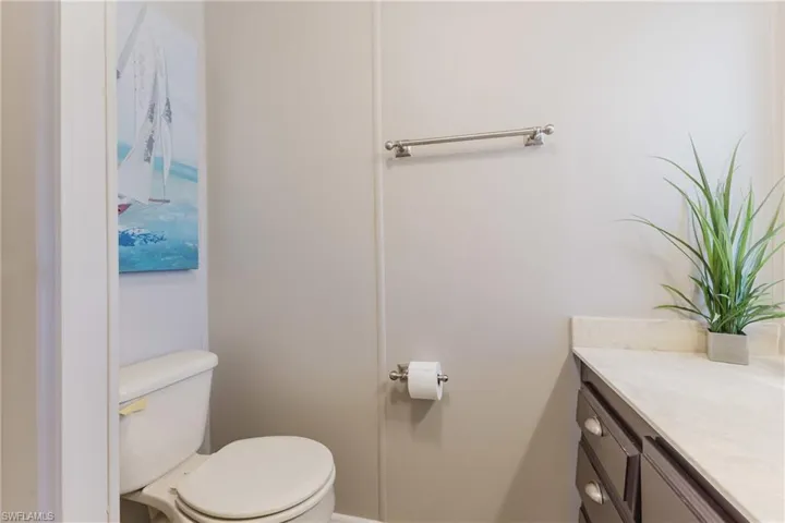Bathroom with vanity and toilet