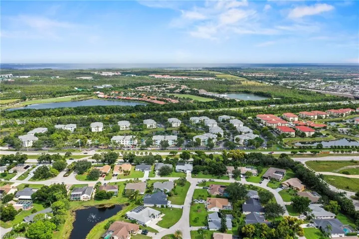 Aerial overview of property's location featuring nearby suburban area