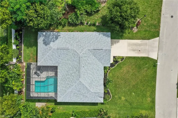 View from above of property featuring a pool