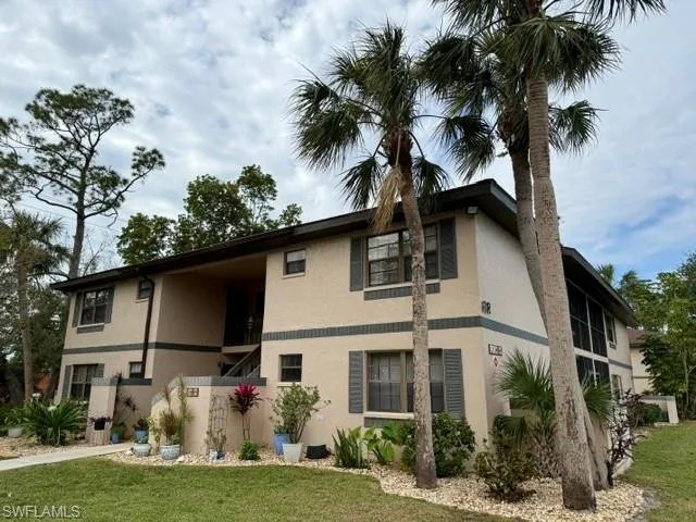 View of front of property featuring a front lawn