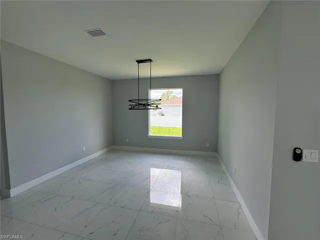 View of tiled empty room