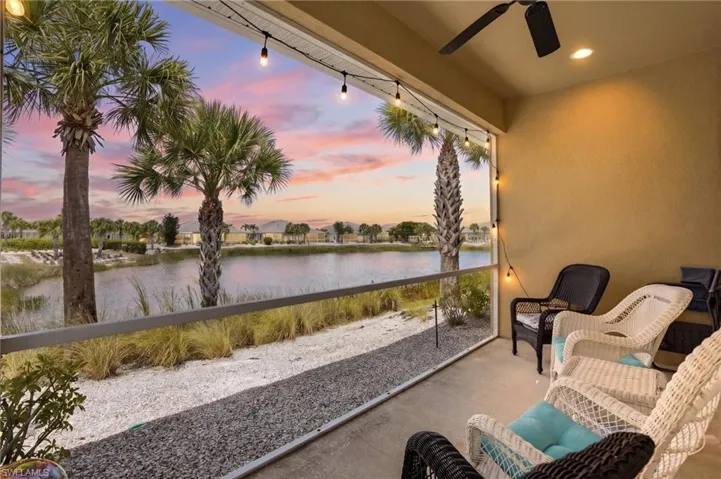 Screened patio featuring a ceiling fan, recessed lighting, and string lights