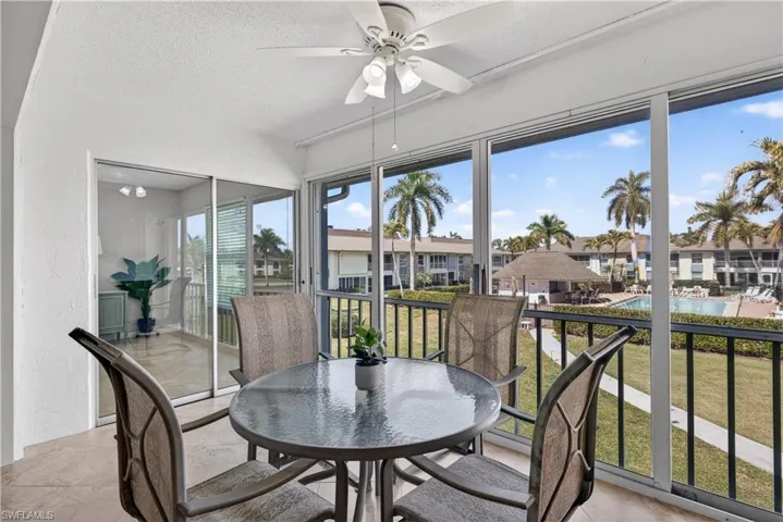 Sunroom overlooking the pool.