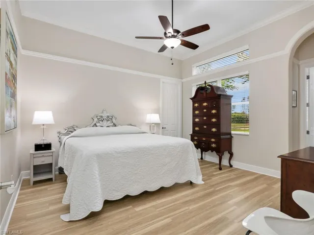 First Floor Bedroom, with beautiful wood molding, and LVP flooring.