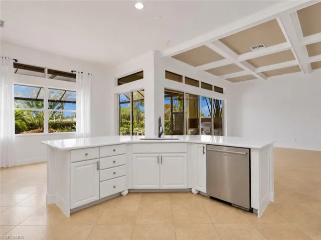 Open concept kitchen with pool views