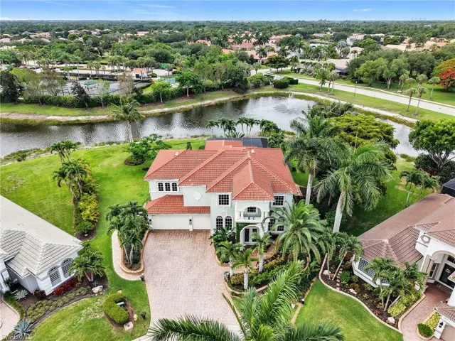 Almost a half acre with beautiful lake views through a three car garage at the end of a cul-de-sac