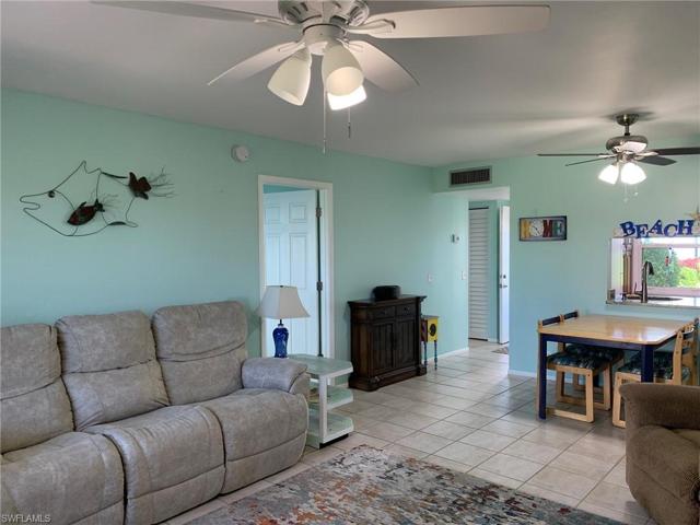 Living Room/Dining Room with 2 Ceiling Fans