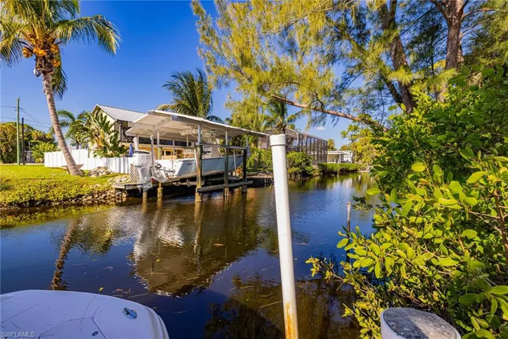 Dock with a water view and boat lift