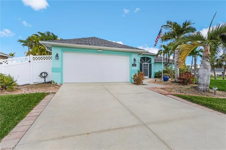 Single story home featuring a garage