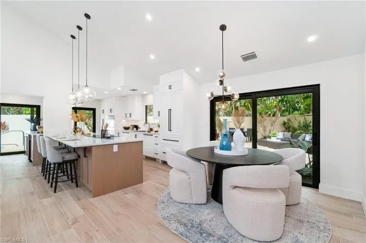 The kitchen has been redesigned - opening the floor plan - uniting the living and dining spaces