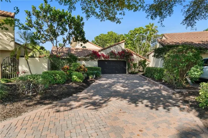 Coastal Villa awaits.  Freshly painted exterior and new landscaping welcome you home.