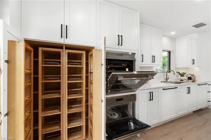 Wood pantry built-ins, with Shaker front