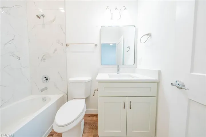 Full bath featuring vanity and tub / shower combination