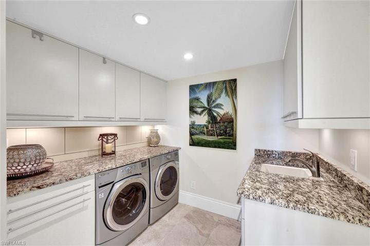 Massive Laundry Room with Storage and Pantry Space