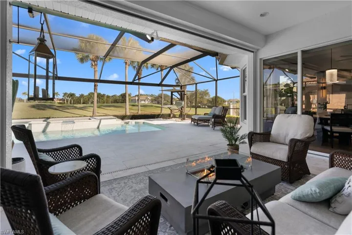View of patio / terrace with an outdoor hangout area, a lanai, a sunroom, and an outdoor pool