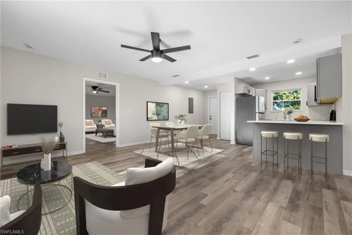 Living room with light wood-type flooring