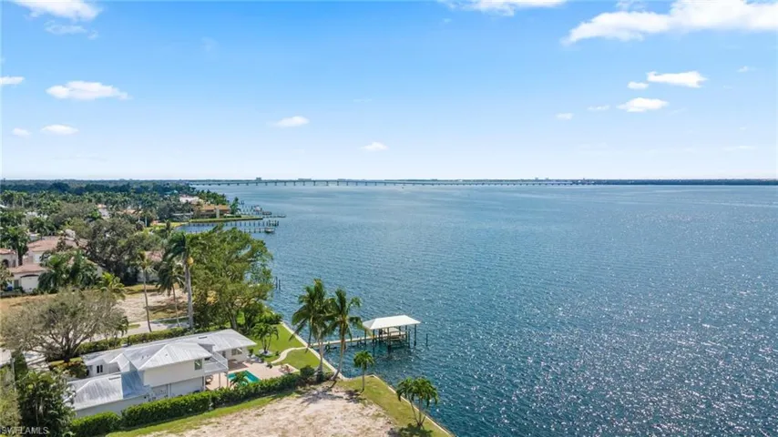 Aerial view of a notable bridge and a nearby body of water