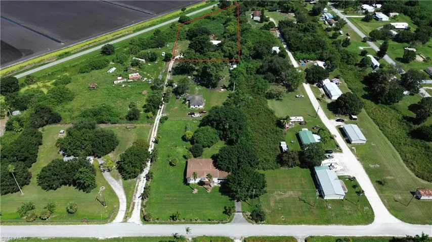 Aerial view of property's location featuring property parcel outlined