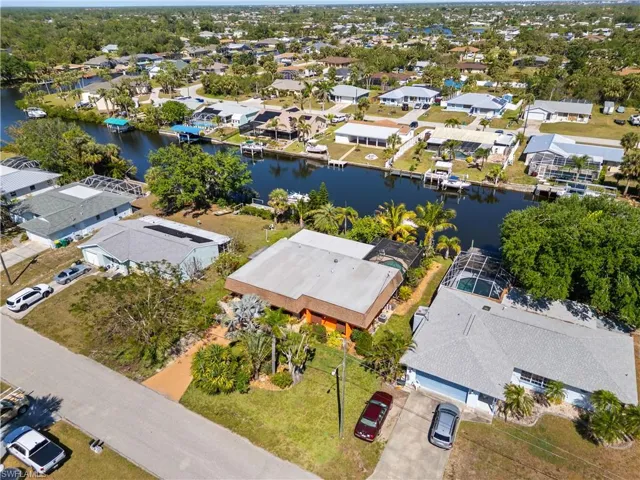 Aerial view of residential area with a large body of water