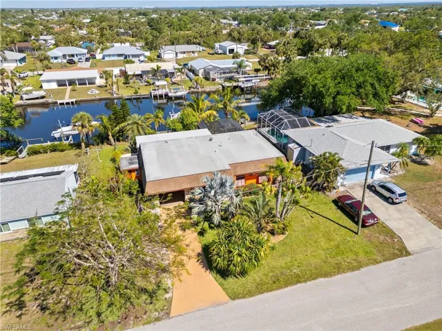 Aerial view of residential area with a large body of water