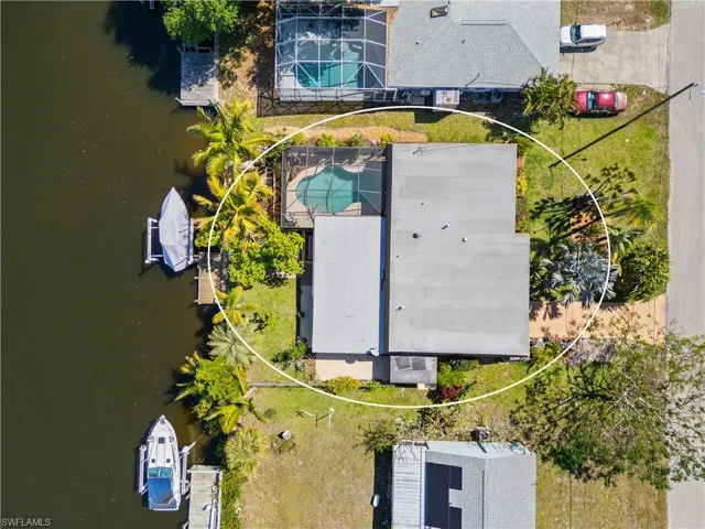 Bird's eye view of a large body of water and a pool