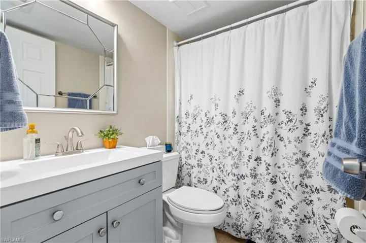 Full bathroom with vanity