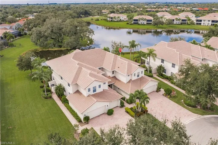 Aerial view of residential area with a large body of water
