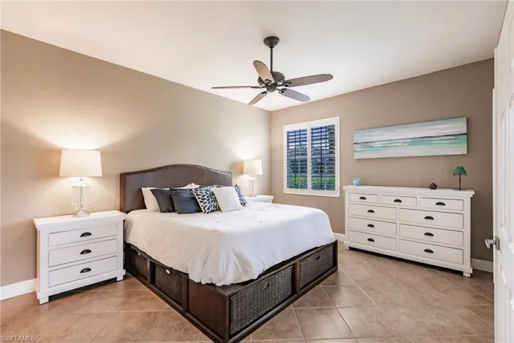 Bedroom featuring ceiling fan and light tile patterned floors
