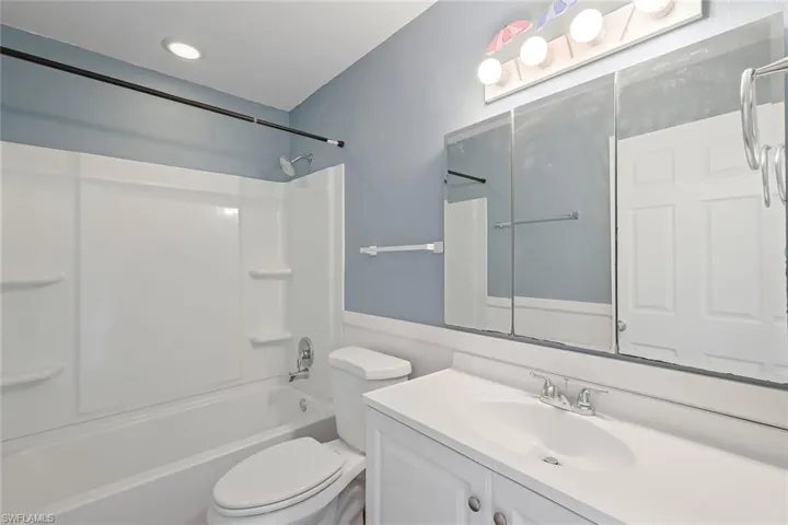 Full bath with vanity and bathtub / shower combination