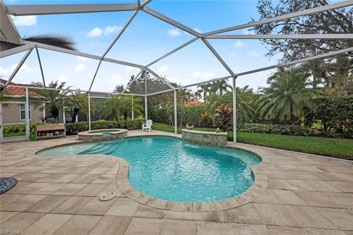 Relax in your private back yard by the sparkling pool