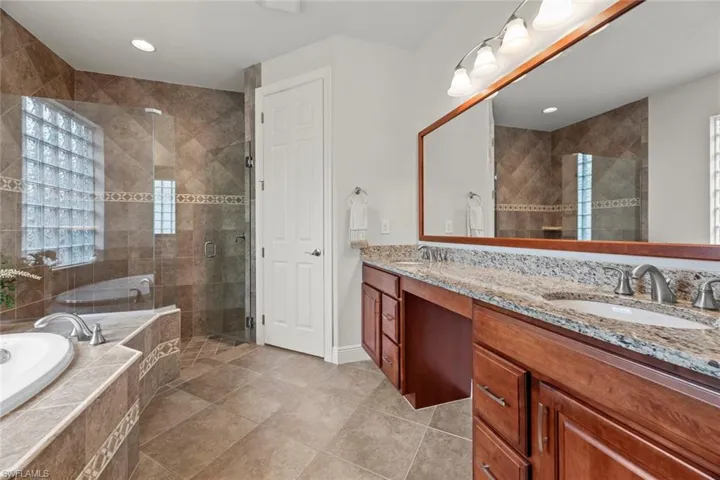 Master bath - dual sinks, water closet behind door