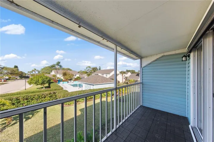 Balcony featuring a residential view