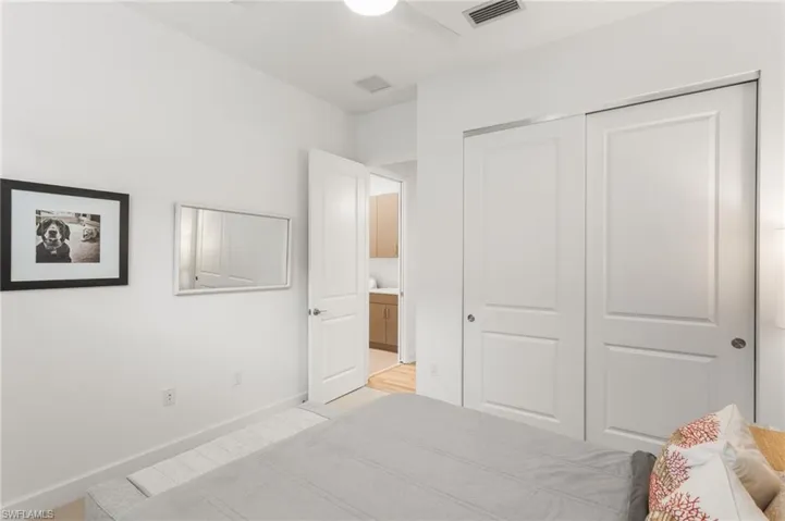 Bedroom featuring a closet and ceiling fan