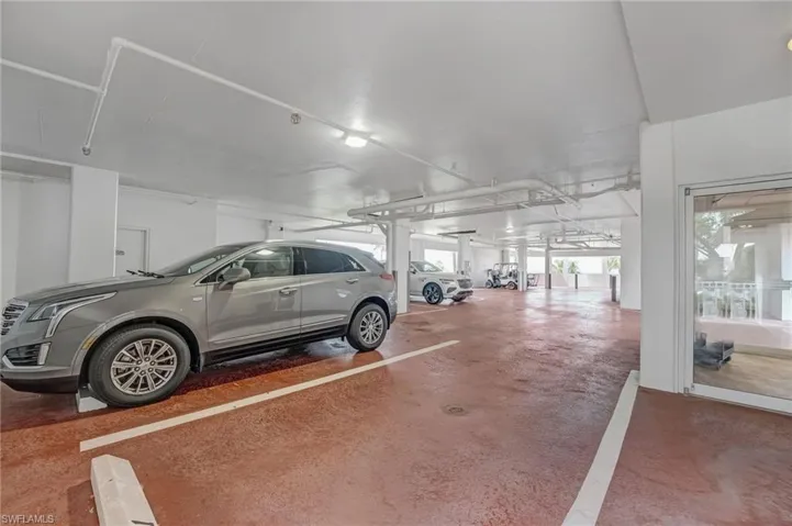 One assigned parking spot (#240) is conveniently tucked under the building, protected from the elements, with a storage room located directly in front. From here, you’re literally just steps away from your elevator.